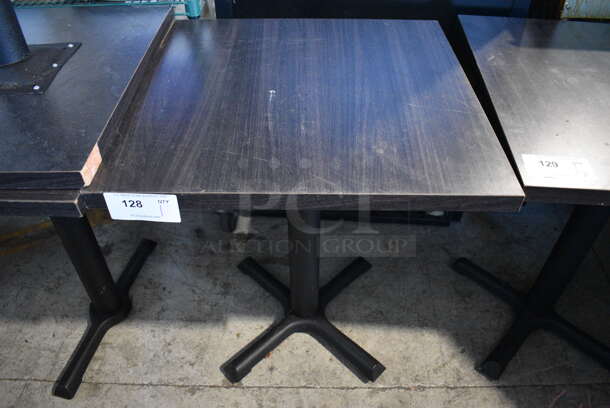 Dark Gray Wood Pattern Dining Table on Black Metal Table Base. Stock Picture - Cosmetic Condition May Vary. 24x24x29.5