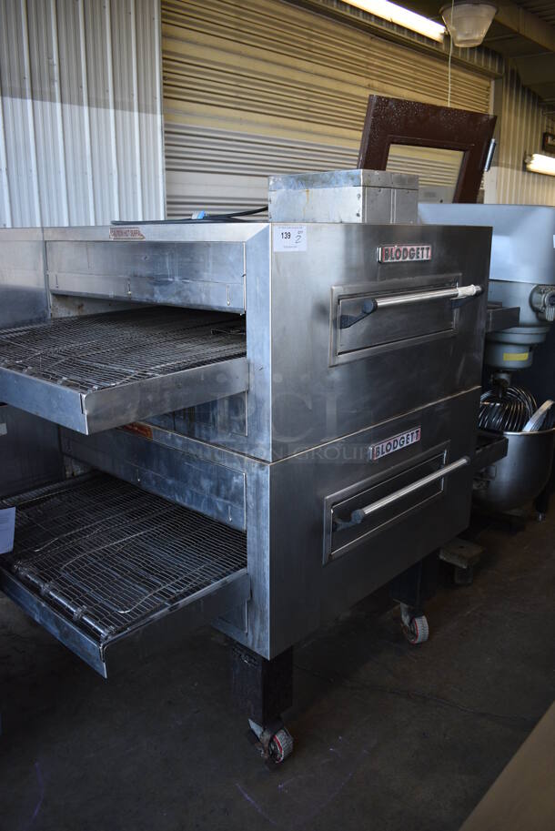 2 Blodgett MT3240G Stainless Steel Commercial Natural Gas Powered Conveyor Pizza Oven w/ 2 Control Panels on Commercial Casters. 100,000 BTU. 75x55x58. 2 Times Your Bid!