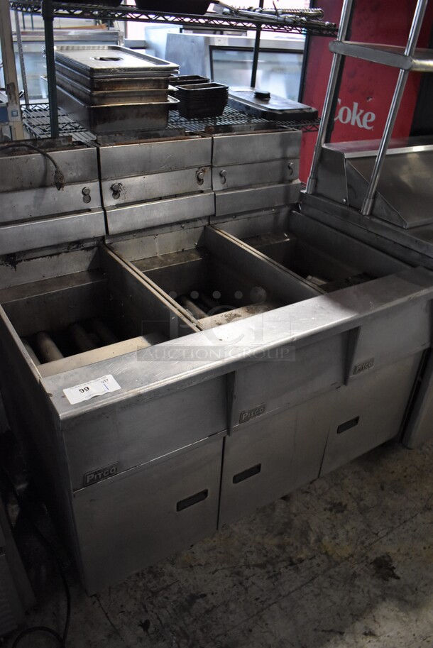 Pitco Frialator SG14-3 Stainless Steel Commercial Natural Gas Powered 3 Bay Deep Fat Fryer on Commercial Casters. 122,000 BTU. 47x35x46