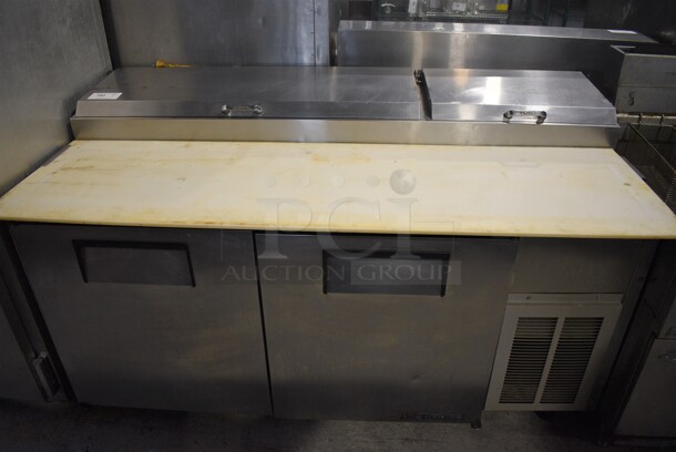 True Model TPP-67 Stainless Steel Commercial Pizza Prep Table w/ Cutting Board on Commercial Casters. 115 Volts, 1 Phase. 67x34x43. Tested and Working!