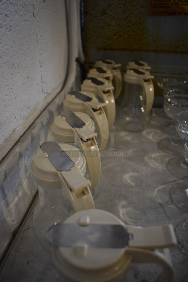 10 Glass Syrup Pourers. 4.5x3.5x6. 10 Times Your Bid! - Image 2 of 3