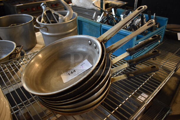 7 Metal Skillets. 18x10.5x2. 7 Times Your Bid!