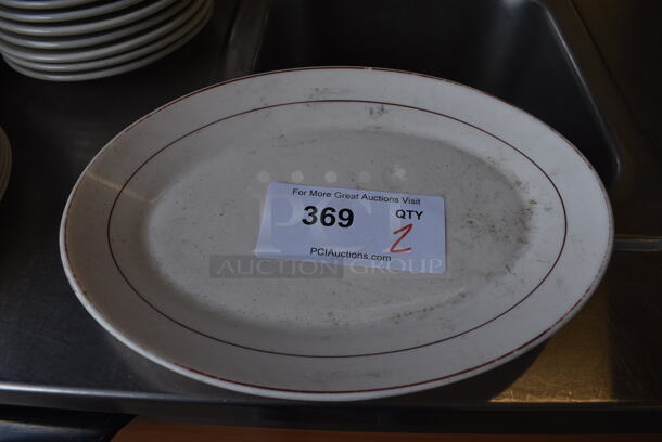2 White Ceramic Oval Plates. 11.5x8.5x1. 2 Times Your Bid!