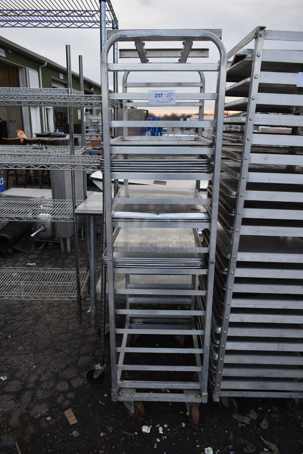 Metal Commercial Pan Transport Rack w/ 15 Metal Baking Pans on Commercial Casters.  - Image 1 of 2