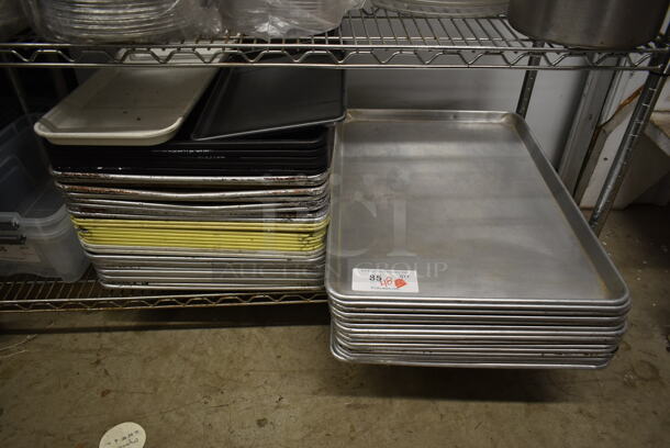 ALL ONE MONEY! Lot of 48 Various Metal Baking Pans and Poly Trays. Includes 18x26x1 - Image 1 of 5