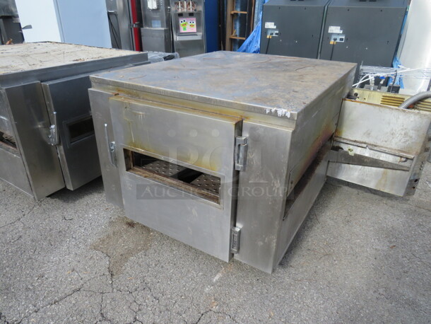 Double Stack Lincoln Impinger Conveyor Pizza Oven On Casters. Unable To Test. Model#1452. 120/208 Volt. 3 Phase. 2XBID. 2 Pizza Ovens Makes 1 Unit!!! 