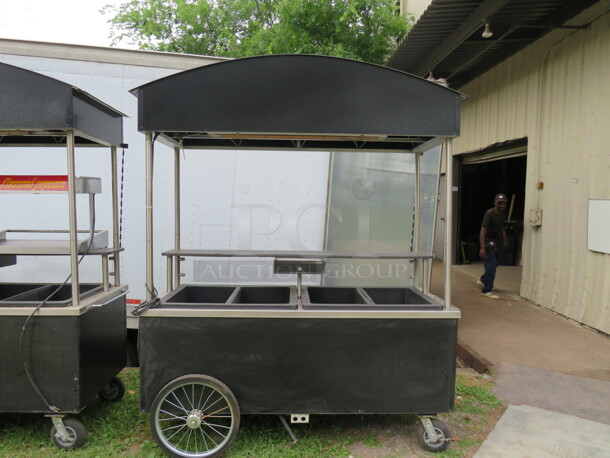 One Beverage Kiosk With 4 Wells 13.5X21.5X15, Serve Counter, Cash Drawer, Chip Clip, Lights And On Casters. 75X31X91