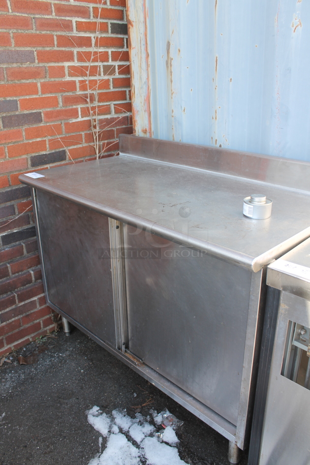 Stainless Steel Commercial Table w/ Back Splash and 2 Doors.