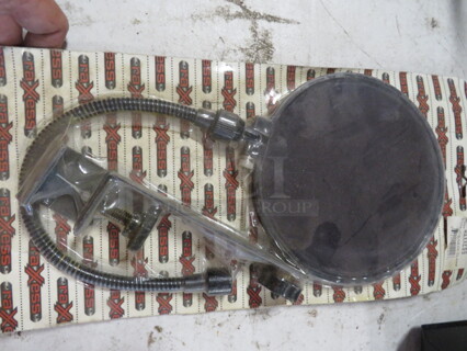 One NEW Raxxess Clamp.