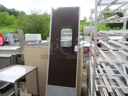 One Kitchen Traffic Door. 22X82.5