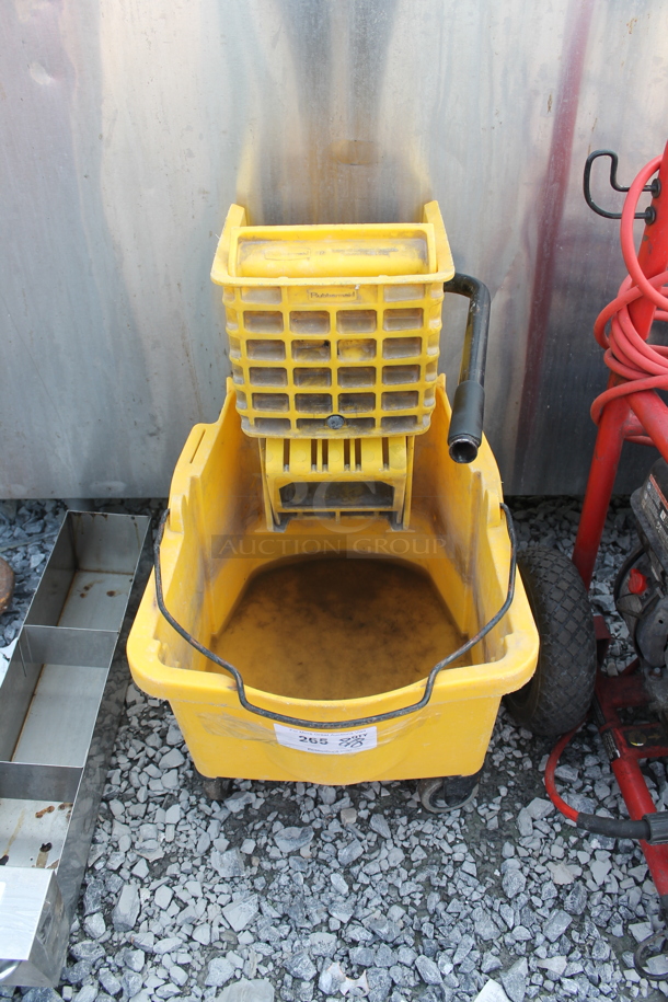 Yellow Poly Mop Bucket w/ Wringing Attachment on Casters. - Image 1 of 4