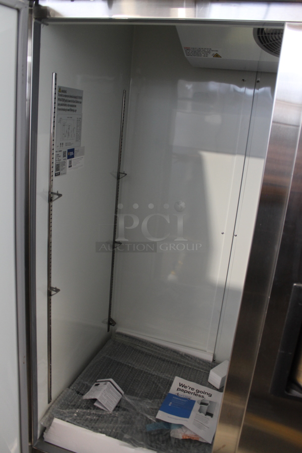 BRAND NEW SCRATCH AND DENT! 2022 Avantco 178A49RHC Stainless Steel Commercial 2 Door Reach In Cooler w/ Poly Coated Racks on Commercial Casters. 115 Volts, 1 Phase. Tested and Working! - Image 5 of 8