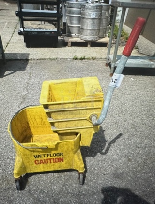 One Mop Bucket And Wringer.