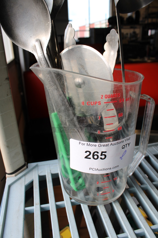 ALL ONE MONEY! Lot of Various Metal Utensils Including Serving Spoons, Ladle and Tongs in Clear Poly Pitcher.  - Image 4 of 4