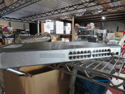 One Cisco Catalyst 24 Port Switch. #3750 V2 Series. 