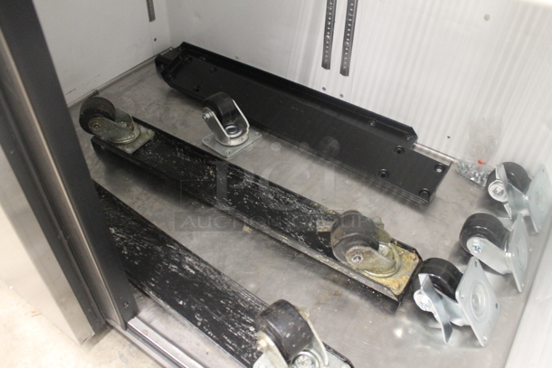 2014 True TG2R-2S ENERGY STAR Stainless Steel Commercial Two Door Reach In Cooler w/ Poly Coated Racks. Comes w/ Commercial Casters. 115 Volts, 1 Phase. Tested and Working! - Image 7 of 8