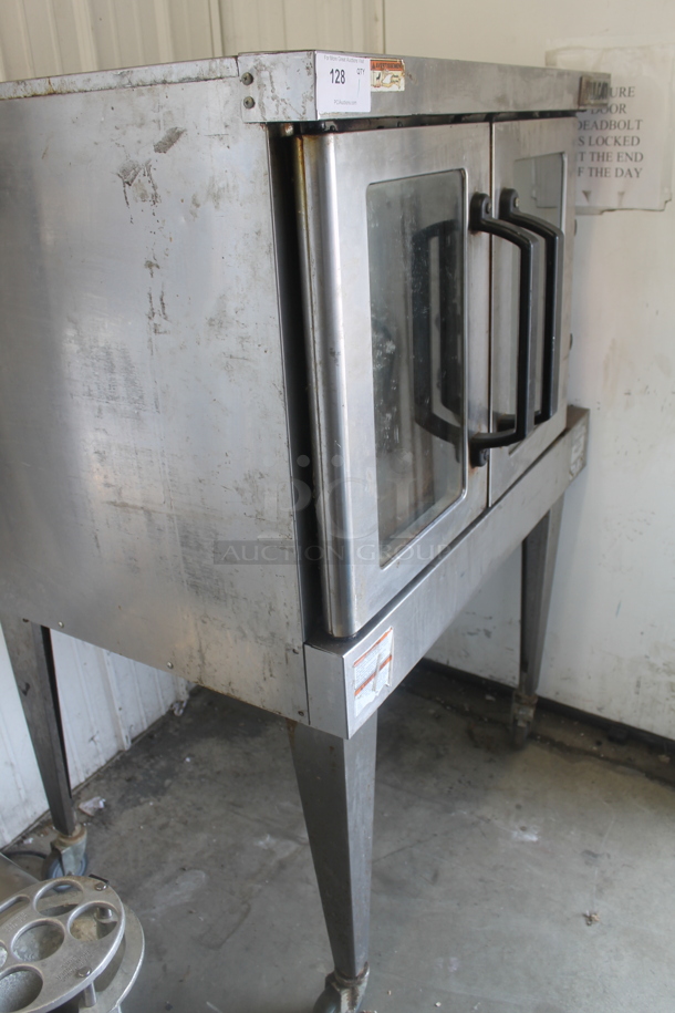 Vulcan VC4GD-11D150K Stainless Steel Commercial Natural Gas Powered Full Size Convection Oven w/ View Through Doors, Thermostatic Controls and Legs on Commercial Casters.  - Image 2 of 6
