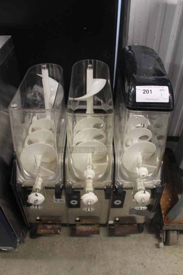 Elemco FC3 Stainless Steel Commercial Countertop 3 Hopper Slushie Machine. Missing 2 Lids. 115 Volts, 1 Phase. Tested and Powers On But Does Not Get Cold - Image 1 of 6