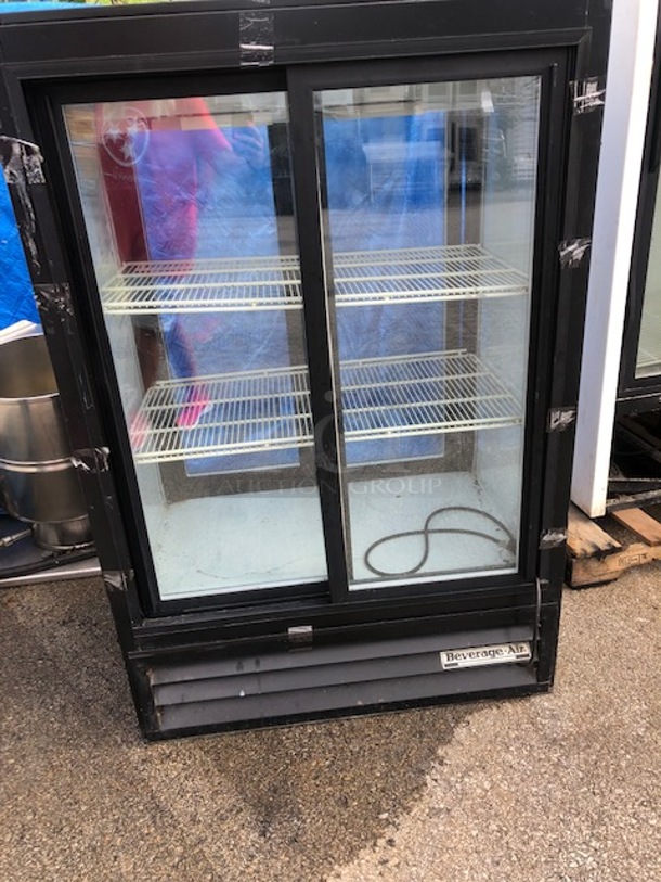 One Beverage Air Glass Door Cooler. With 2 Racks. Model# MT15-54. 115 Volt. 36X24X54.5. Working Not Cold.