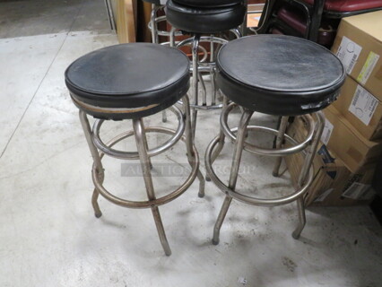 Double Chrome Ring Bar Stool With A Black Cushioned Swivel Seat. Need To Be Recovered. 2XBID