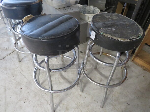 Double Chrome Ring Bar Stool With A Black Cushioned Swivel Seat. Need To Be Recovered. 2XBID - Image 1 of 1