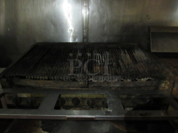 One Counter Top Natural Gas Charbroiler. 48X38X21