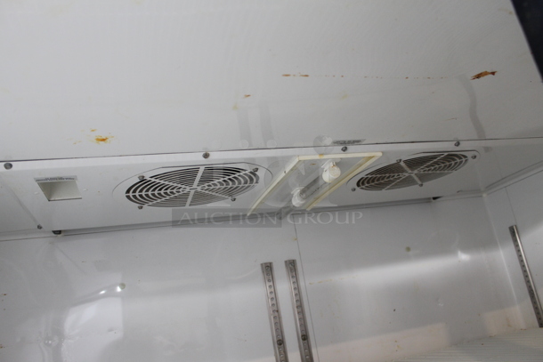 2013 True TG2R-2S ENERGY STAR Stainless Steel Commercial 2 Door Reach In Cooler w/ Poly Coated Racks on Commercial Casters. 115 Volts, 1 Phase. Tested and Working! - Image 10 of 11