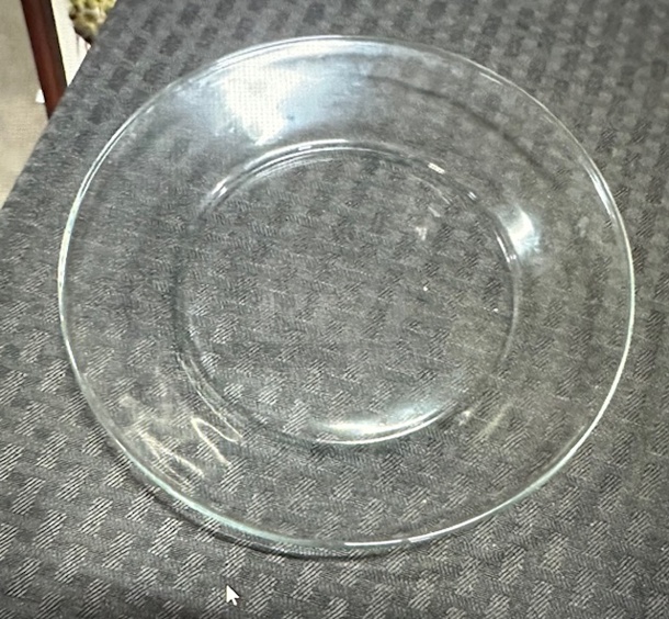 7 Inch Round Clear Glass Plate. 10XBID - Image 1 of 1