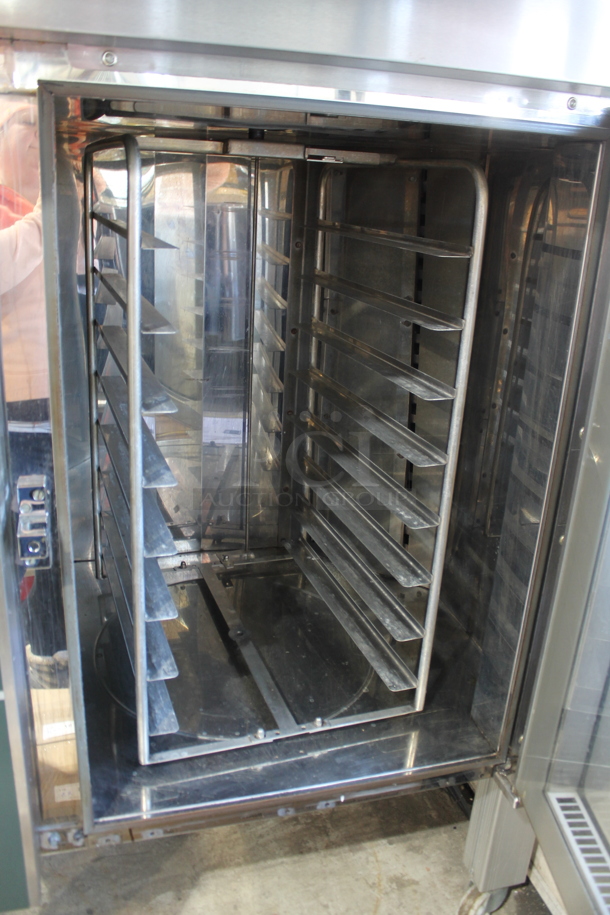 2013 Sveba Dahlen Gemini S402 Stainless Steel Commercial Floor Style Natural Gas Powered Mini Rotating Rack Oven on Commercial Casters.  - Image 3 of 12