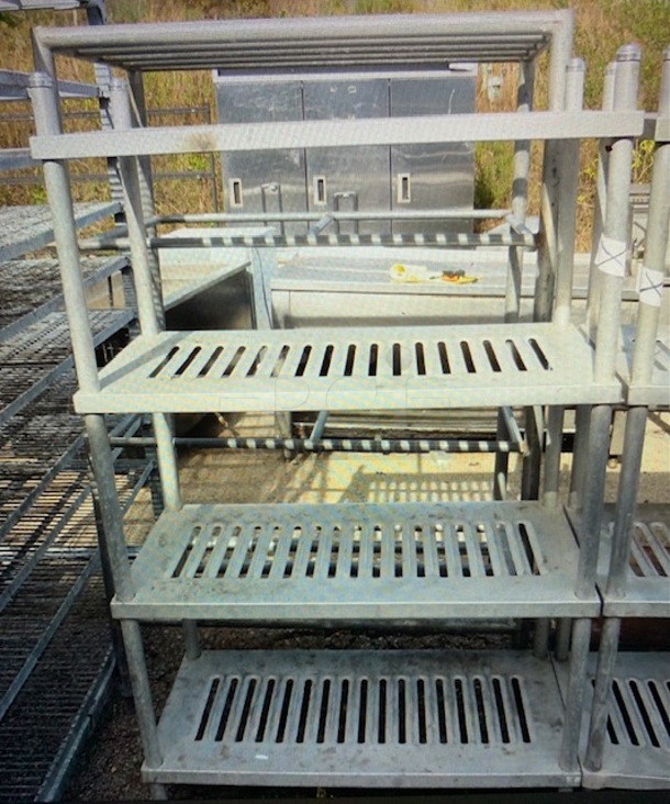 One Metal Shelving System  With 4 Shelves. 36X18X61 - Image 1 of 1