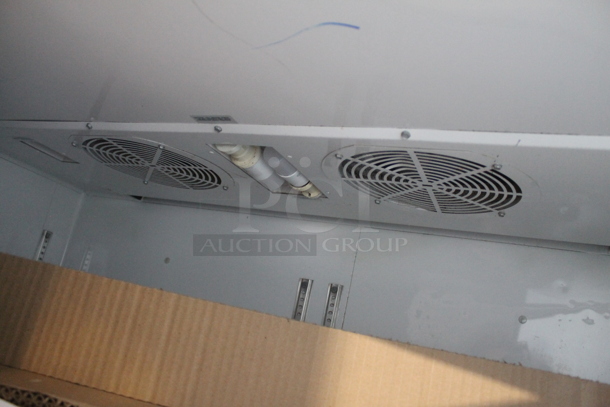 2015 True TG2R-2S ENERGY STAR Stainless Steel Commercial Two Door Reach In Cooler w/ Poly Coated Racks on Commercial Casters. 115 Volts, 1 Phase. Tested and Working! - Image 7 of 8