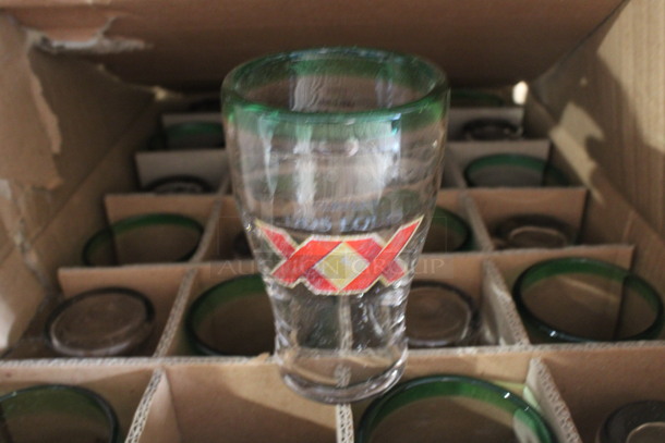 24 BRAND NEW IN BOX! Dos Equis Beverage Glasses. 3.5x3.5x6. 24 Times Your Bid!
