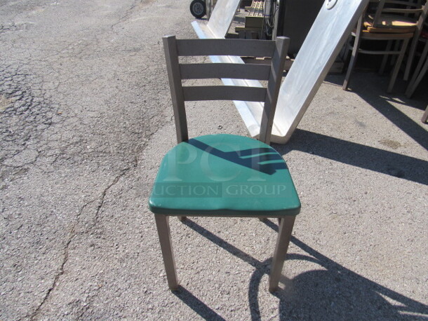 Brown Metal Chair With A Green Poly Seat. 2XBID