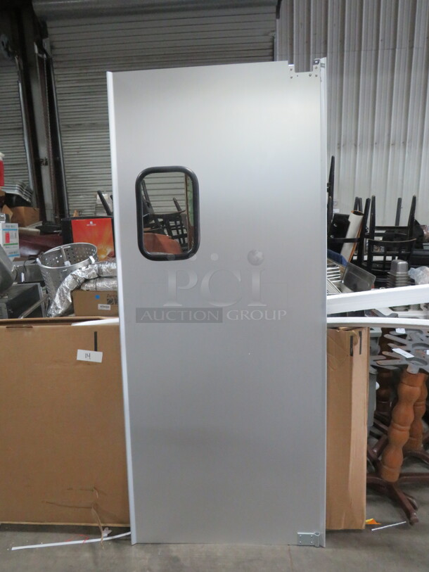 One NEW Kitchen Traffic Door. 35X83 - Image 1 of 1