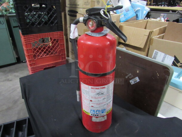 One Kidde ABC Fire Extinguisher.