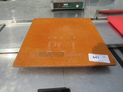 One 20X20 Wooden Cutting Board.