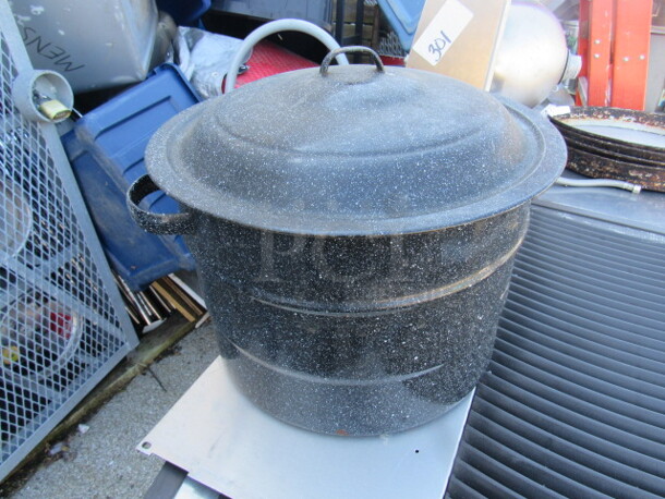 One Stock Pot With Lid.
