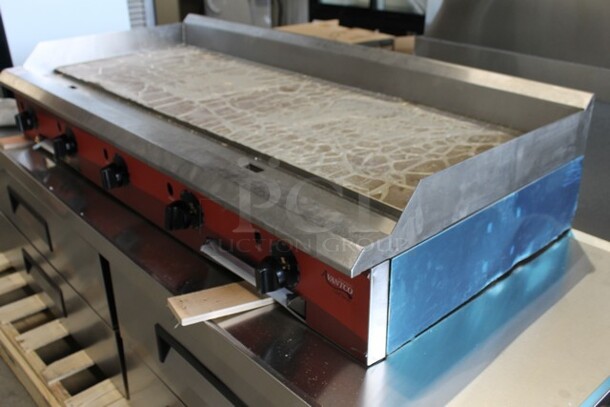 BRAND NEW SCRATCH AND DENT! 2021 Avantco 177CAG60TG Stainless Steel Commercial Countertop Natural Gas Powered Flat Top Griddle.  - Image 7 of 9
