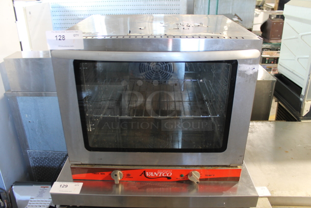 Avantco 177CO28 Stainless Steel Commercial Countertop Electric Powered Half Size Convection Oven w/ View Through Door and Metal Oven Racks. 208-240 Volts, 1 Phase. 