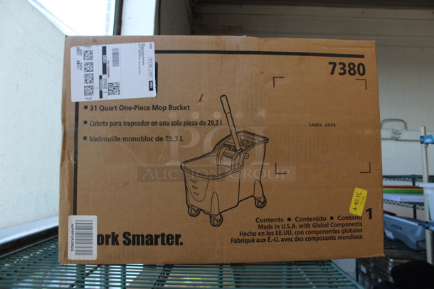 BRAND NEW IN BOX! Poly Mop Bucket w/ Wringing Attachment on Commercial Casters.