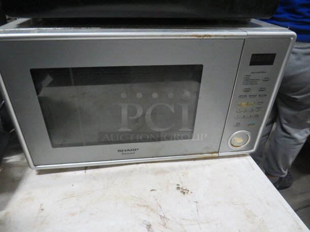 One Sharp Microwave. Model# R-318AV. 120 Volt.  - Image 1 of 1