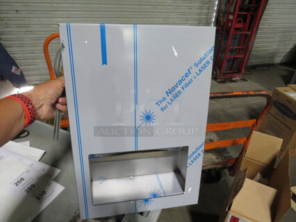 One Bobrick Stainless Steel Recessed Paper Towel Dispenser. #35903