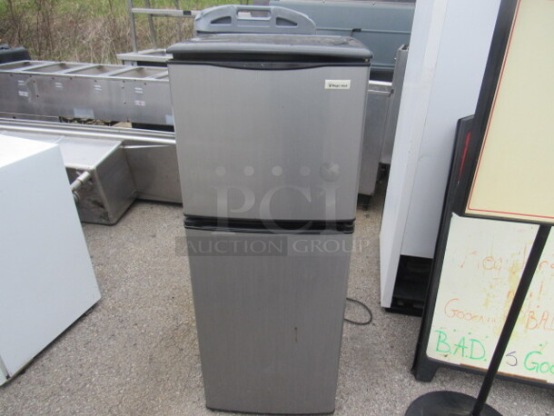 One Magic Chef Refrigerator/Freezer. 115 Volt. Model# MCBR415S. 19X18X49.5