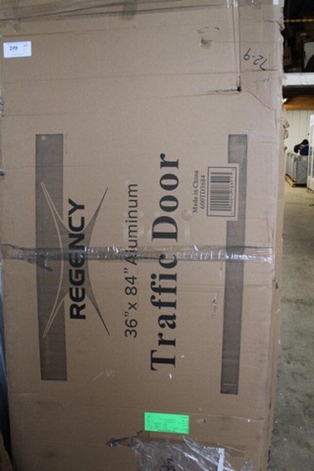 BRAND NEW SCRATCH AND DENT! Regency 600TD3684 Single Aluminum Swinging Traffic Door with 9" x 14" Window - 36" x 84" Door Opening - Image 2 of 3