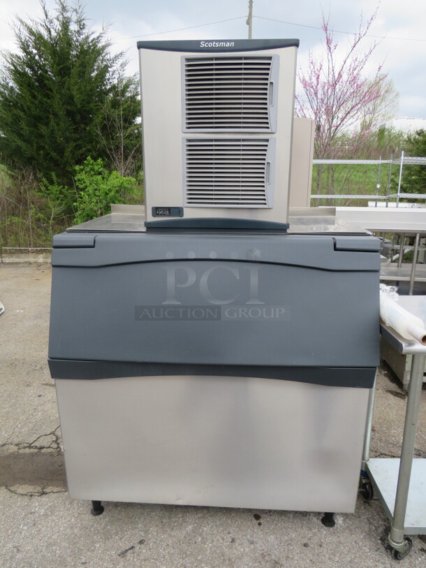 One Scotsman Ice Maker And Ice Bin. Bin # B948S. Ice Maker #NH0922A-32A. 208-230 Volt. 1 Phase. 48X34X80. $11,026.00. WORKING WHEN REMOVED!