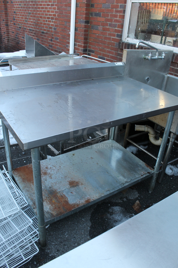 Stainless Steel Table w/ Back Splash and Under Shelf.