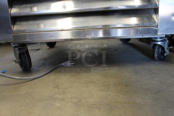 Master-Bilt R23-S Stainless Steel Commercial Single Door Reach In Cooler w/ Poly Coated Racks on Commercial Casters. 115 Volts, 1 Phase. Tested and Powers On But Does Not Get Cold - Image 3 of 5