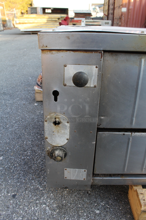 Bakers Pride Stainless Steel Commercial Natural Gas Powered Single Deck Pizza Oven.  - Image 3 of 6