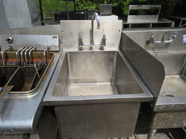 One Stainless Steel Sink With Faucet. 21X30X45 - Image 1 of 2