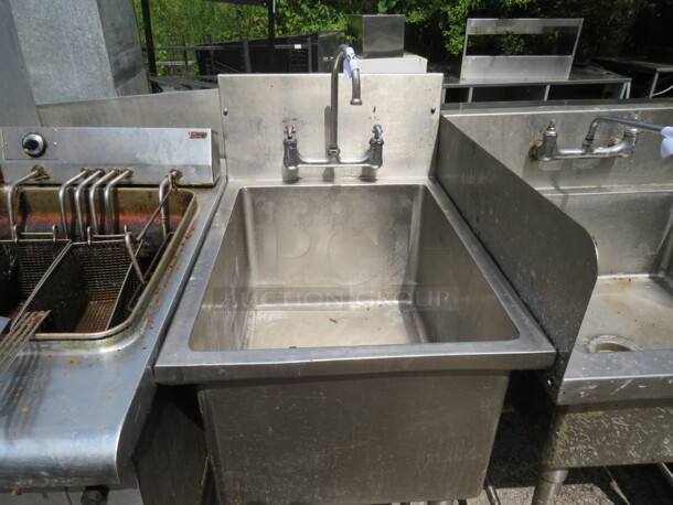 One Stainless Steel Sink With Faucet. 21X30X45